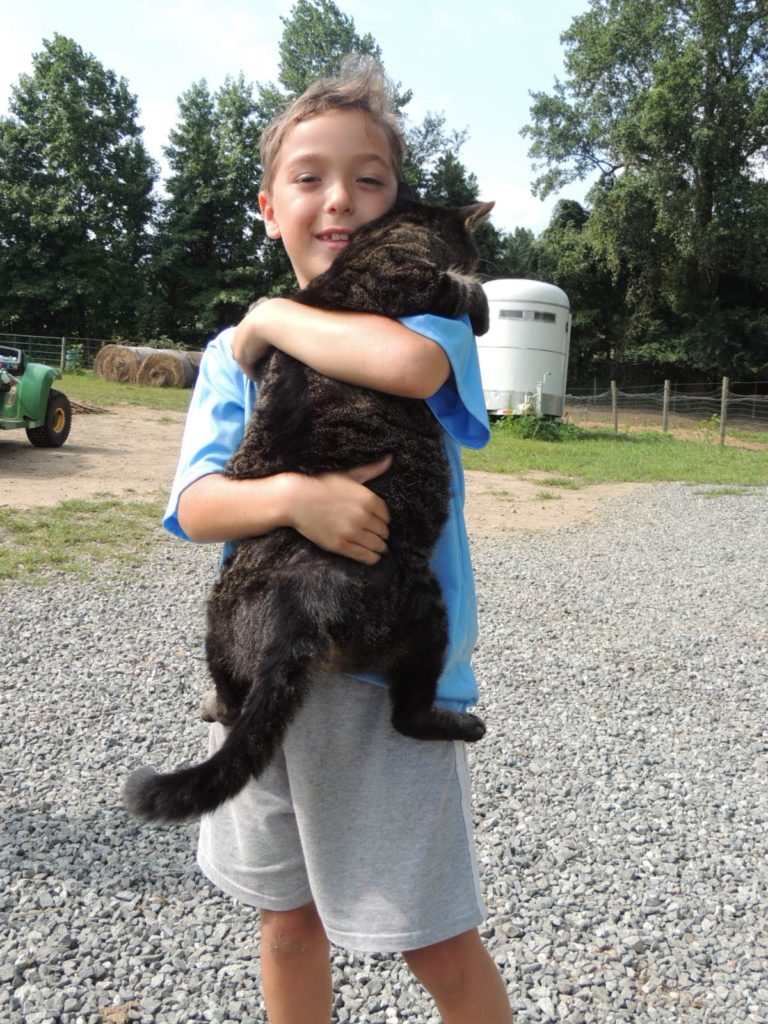 Kid_Hugging_Cat-768x1024